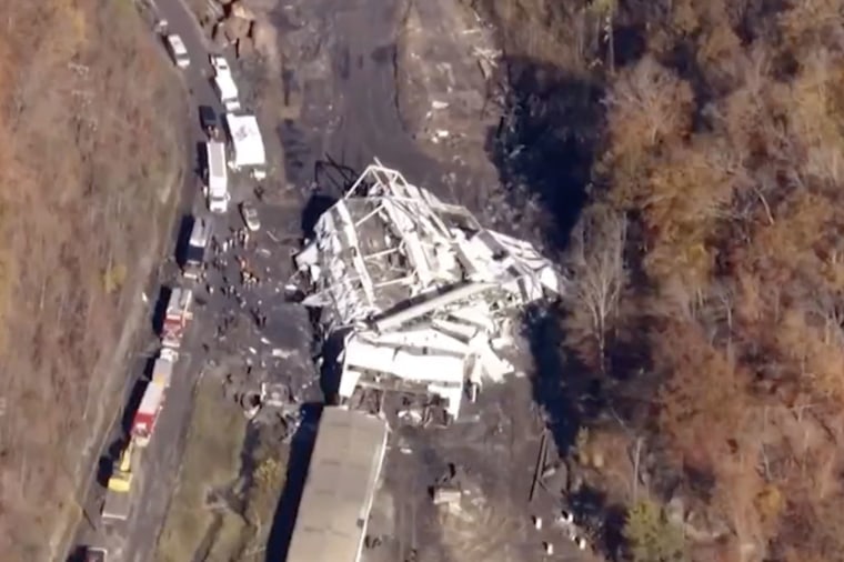 Emergency personnel work at the scene of a coal mine collapse in Ky.