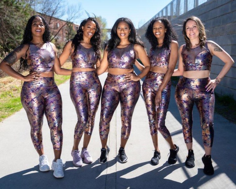 Nicole Mitchell, center, is founder of Goddess Athleisure.