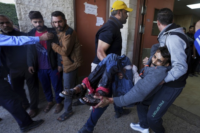 Palestinians injured by Israeli forces trying to cross back in to northern Gaza