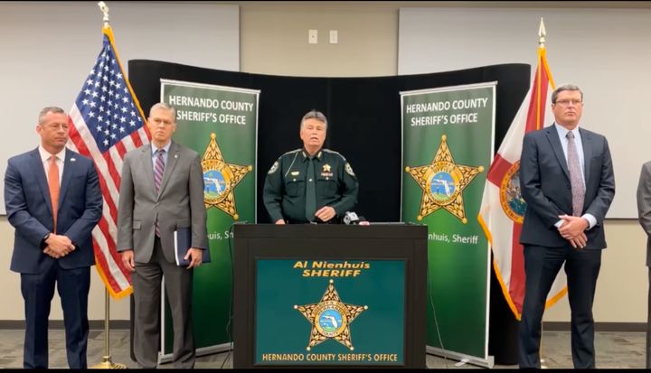 Hernando County Sheriff Al Nienhuis at a news conference alongside state and federal officers.