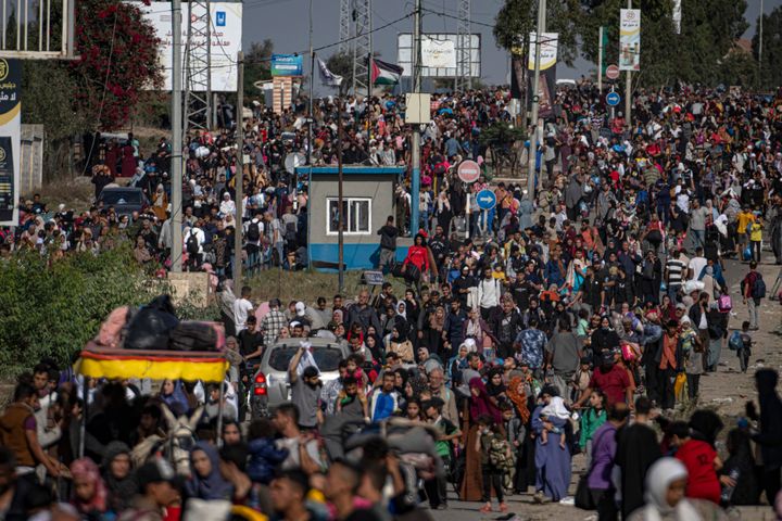 Palestinians flee to the southern Gaza Strip on Salah al-Din Street in Bureij, Gaza Strip, Friday, Nov. 10, 2023. (AP Photo/Fatima Shbair)