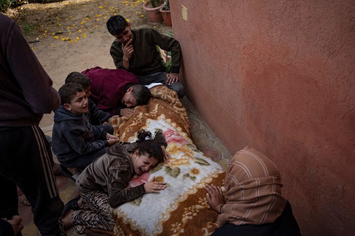 Palestinians mourn their relatives killed in the Israeli bombardment of the Gaza Strip, in the hospital in Khan Younis, Saturday, Nov. 11, 2023. ( AP Photo/Fatima Shbair)