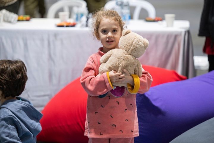 This handout photo provided by the Israel Prime Minister Office shows Yahel Shoham, 3 years old, upon her arrival in Israel after being freed. Yahel was one of the 13 Israeli hostages that Hamas released late Saturday, Nov. 25, 2023, in the second round of swaps under a cease-fire deal. (Israel Prime Minister Office/Handout via AP)