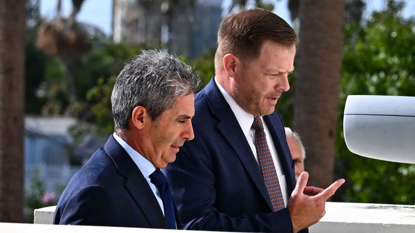 Carlos De Oliveira, left, property manager of former President Donald Trump's Mar-a-Lago estate in Palm Beach, arrives at the Alto Lee Adams Sr. US Courthouse in Fort Pierce, Florida, on August 10, 2023. 
