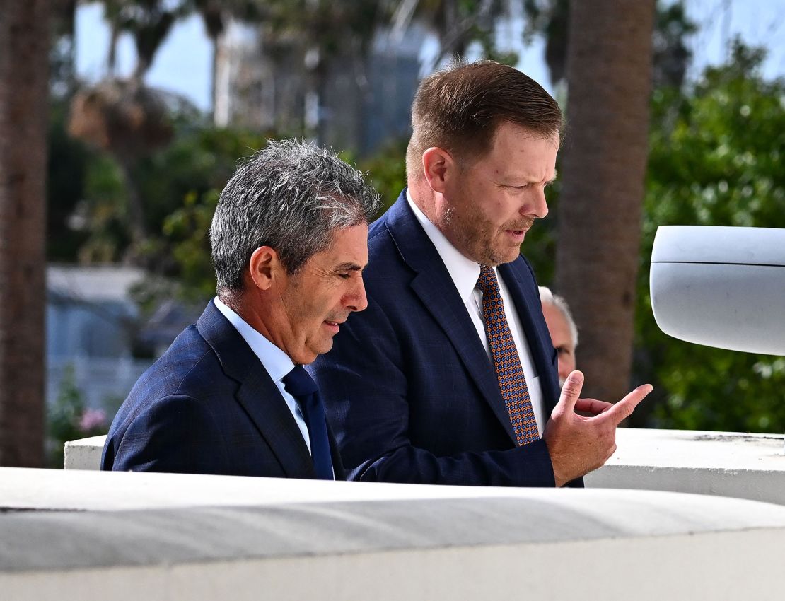 Carlos De Oliveira, left, property manager of former President Donald Trump's Mar-a-Lago estate in Palm Beach, arrives at the Alto Lee Adams Sr. US Courthouse in Fort Pierce, Florida, on August 10, 2023.