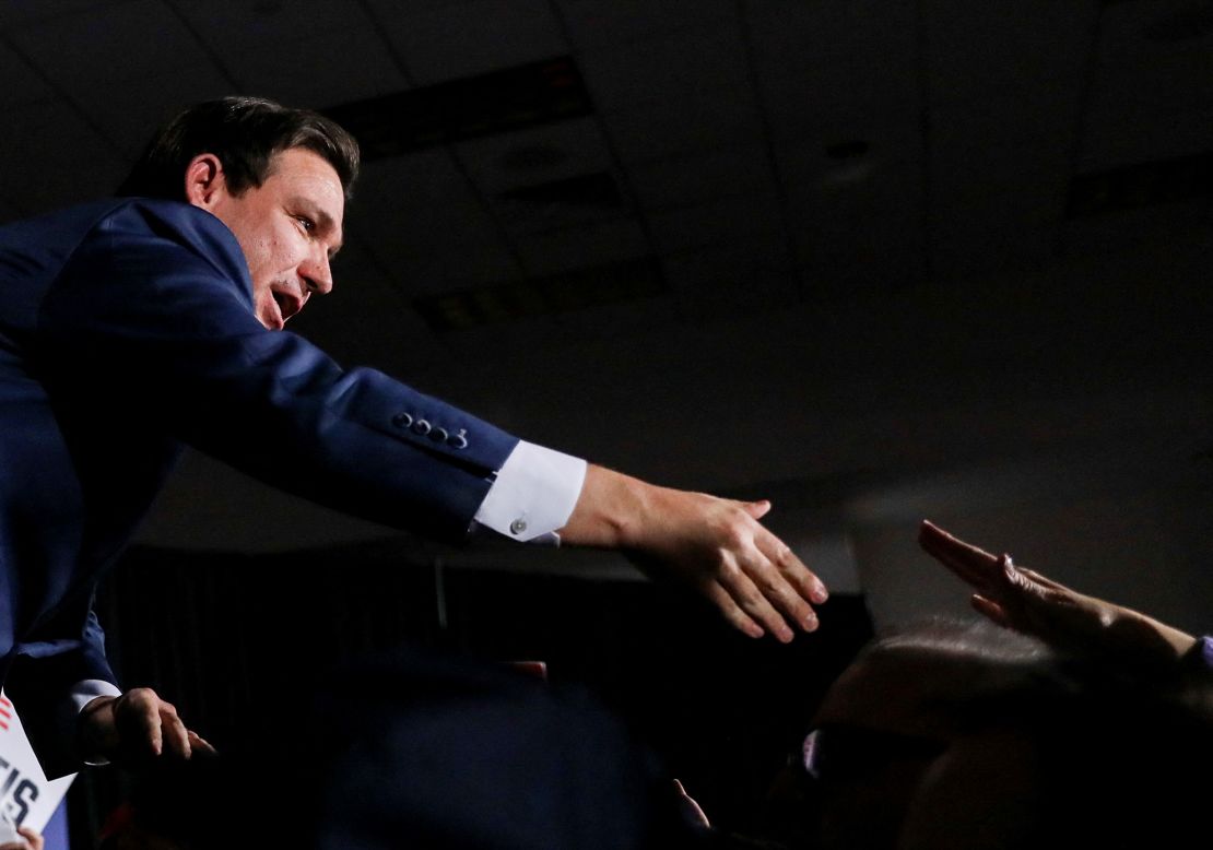 Florida Gov. Ron DeSantis greets supporters at his Iowa caucus watch party in West Des Moines on Monday.