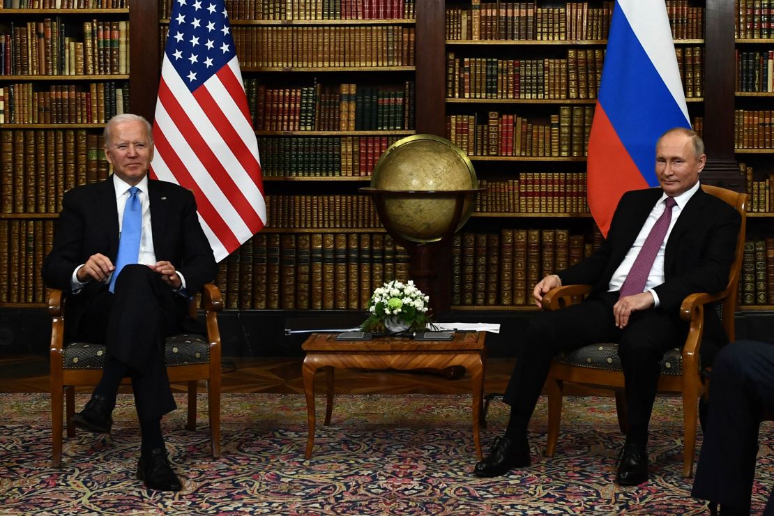 President Joe Biden, left, and Russian President Vladimir Putin, right, pose for press ahead of the US-Russia summit at the Villa La Grange, in Geneva on June 16, 2021. 